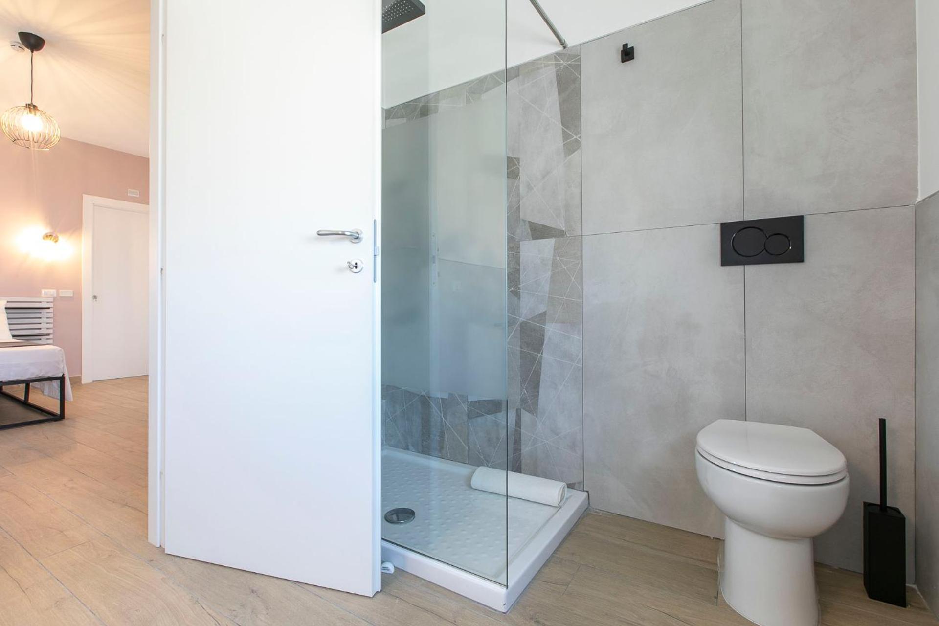 Domina Guest House Fiumicino Esterno foto